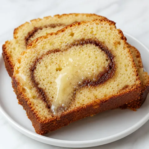 Sliced Keto Cinnamon Bread with a buttery cinnamon swirl