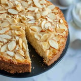 A slice of almond cake on a plate.