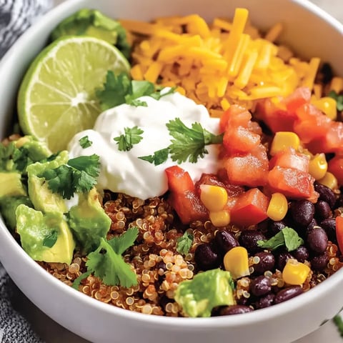 Savory quinoa taco bowl loaded with vibrant toppings, a healthy twist on taco night.