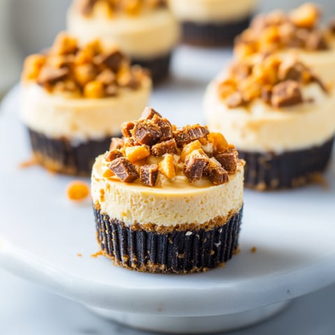 Mini Butterfinger Cheesecakes.