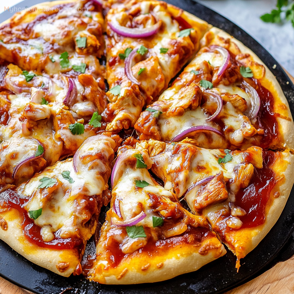 BBQ Chicken Pizza topped with mozzarella and red onion