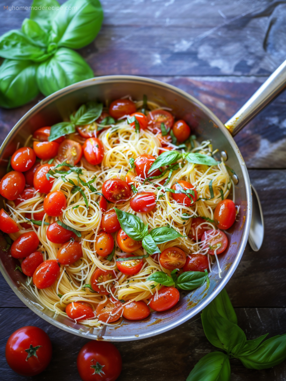 A vibrant bowl of Summer Garden Pasta with cherry tomatoes, basil, and Parmesan cheese