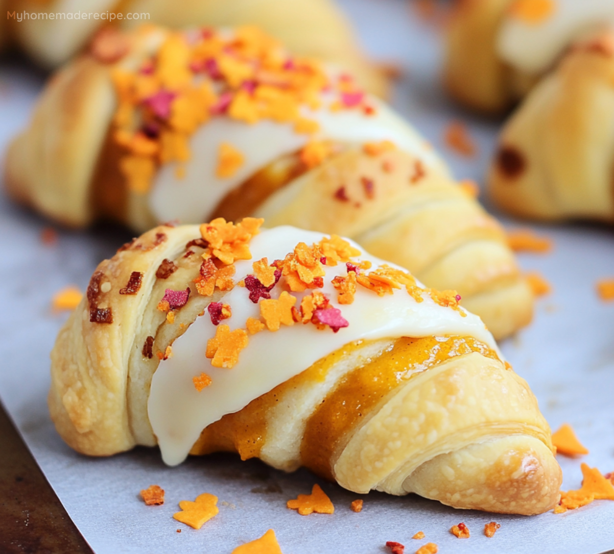 Cream Cheese Pumpkin Pie Crescent Rolls with Orange Icing