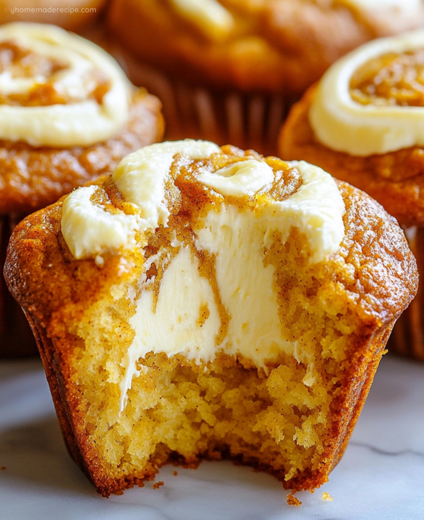 Fluffy Pumpkin Cream Cheese Swirl Muffins